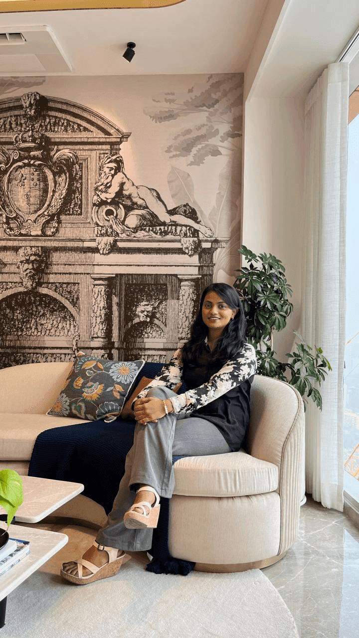 Rutuja seated in a luxury residence consultation setting